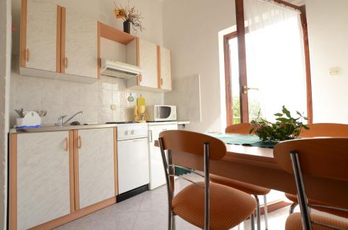 Kuchyň nebo kuchyňský kout v ubytování Apartments Josip
