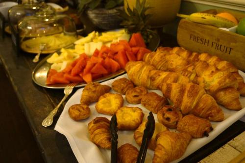a tray of food with pastries and vegetables on a table at Norfolk Arms Hotel in Arundel