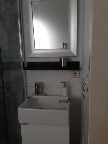 Et badeværelse på Luxe appartement met sauna