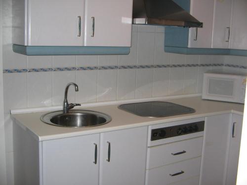 Kuchyň nebo kuchyňský kout v ubytování APCOSTAS - Atlanterra