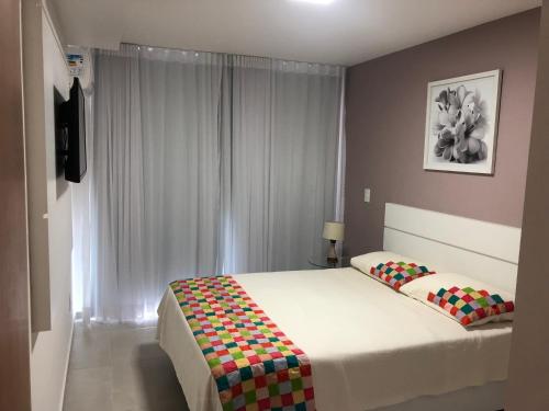 เตียงในห้องที่ Apartamento Luxo em Arraial do Cabo- RJ