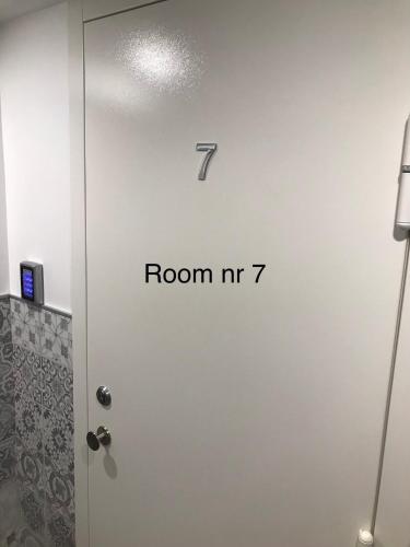 a door with a room written on it at Liivalaia 40 cozy kitchen studio in Tallinn