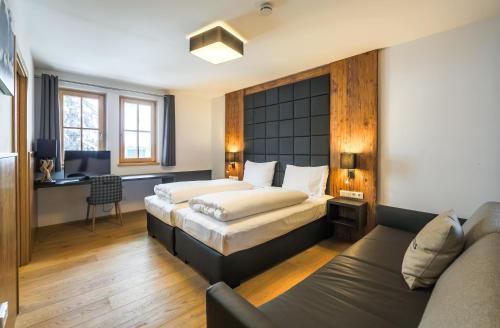 Katil atau katil-katil dalam bilik di Bolodges Apartments by Alpin Rentals