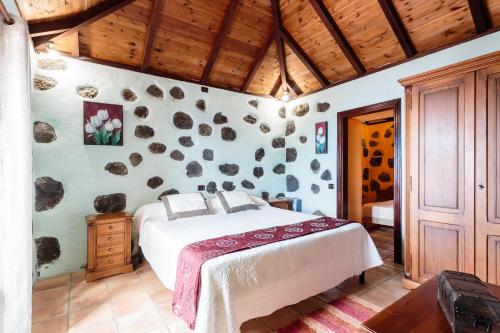 Un pat sau paturi într-o cameră la Los Draguitos