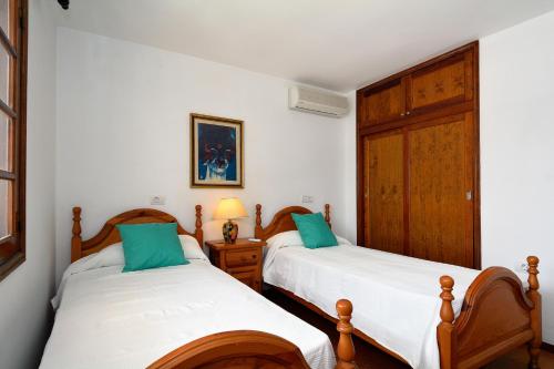 Krevet ili kreveti u jedinici u objektu 3BR Beach House - Solarium & Shower Terrace