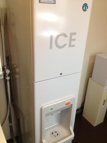 a white refrigerator with a ice box in a bathroom at Hotel Horidome Villa in Tokyo
