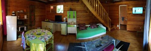 an overhead view of a kitchen in a log cabin at Chalet des plaines in La Plaine des Palmistes