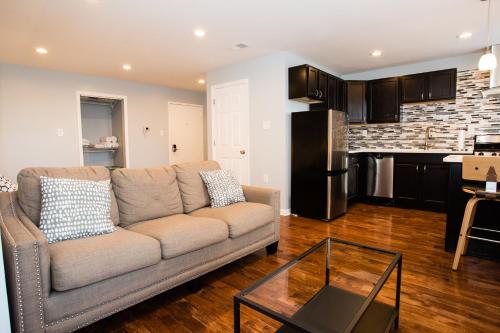 A kitchen or kitchenette at Lawrenceville Suites