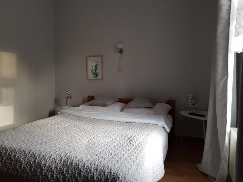 Postel nebo postele na pokoji v ubytování HOTEL "ZAUŁEK" Spółka Cywilna Zbigniew Świderski, Elżbieta Świderska