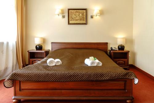 Katil atau katil-katil dalam bilik di Hotel Relax