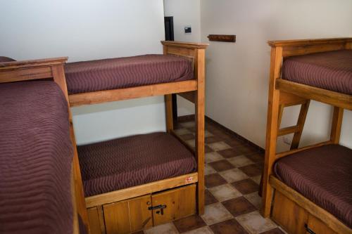 Postel nebo postele na pokoji v ubytování Hostel Inn Calafate