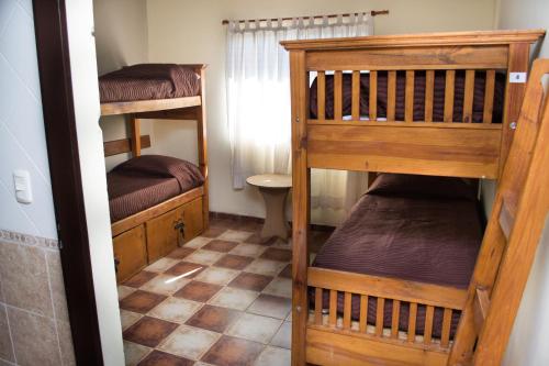 Postel nebo postele na pokoji v ubytování Hostel Inn Calafate