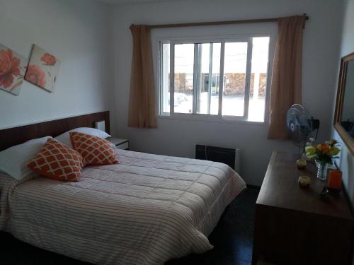 Ένα ή περισσότερα κρεβάτια σε δωμάτιο στο Apartamento #003 Spiaggia Brava