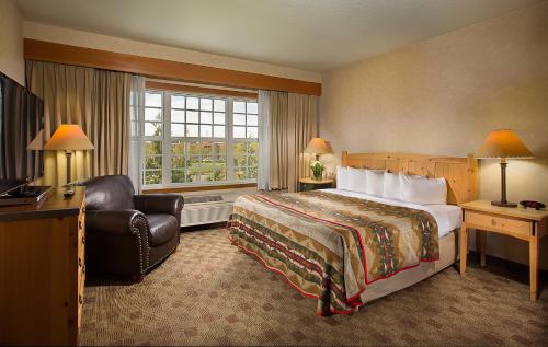 Säng eller sängar i ett rum på Heathman Lodge