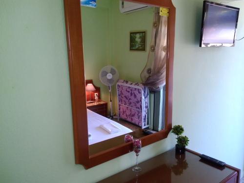 TV a/nebo společenská místnost v ubytování Rooms To Let Giannis