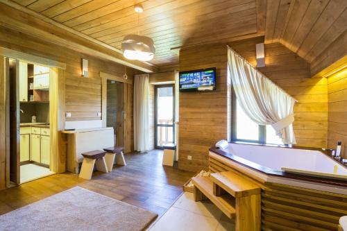 TV a/nebo společenská místnost v ubytování FoRest