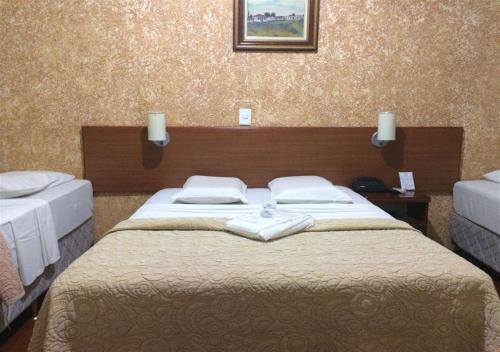Cama ou camas em um quarto em Hotel Rafeli