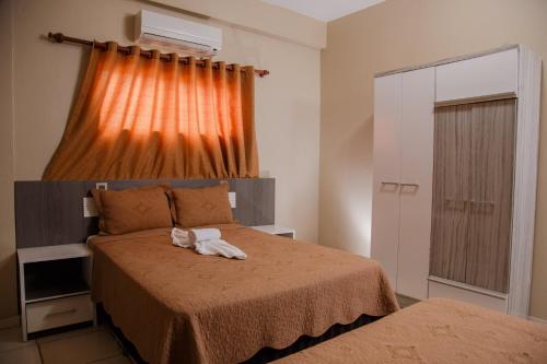 Postel nebo postele na pokoji v ubytování Class Apart Hotel
