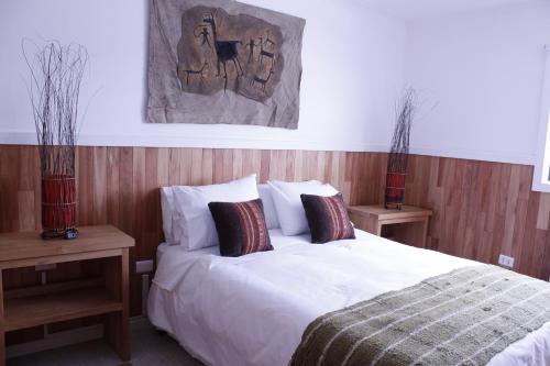 Cama o camas de una habitación en Hotel Aquaterra