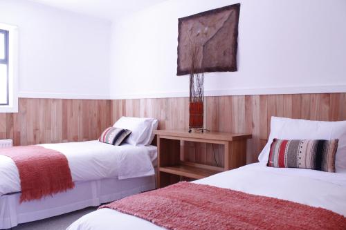 Postel nebo postele na pokoji v ubytování Hotel Aquaterra
