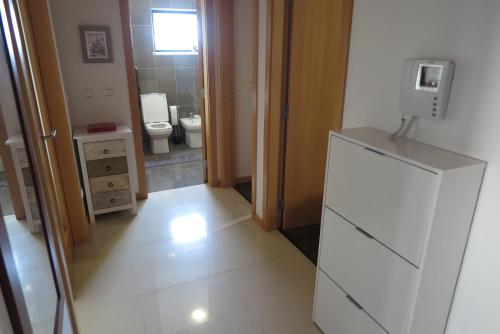 Ванная комната в Partilha Sol Apartment