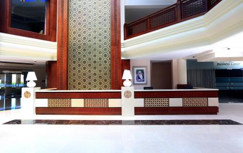 a lobby of a building with aasteryasteryasteryasteryasteryasteryasteryasteryastery at Wyndham Garden Salalah Mirbat in Salalah