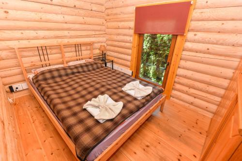 Letto o letti in una camera di Eimio Vila