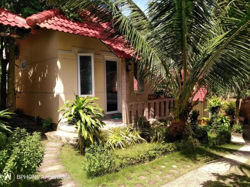 Ein Garten an der Unterkunft Sun & Wind Paradise Bungalow