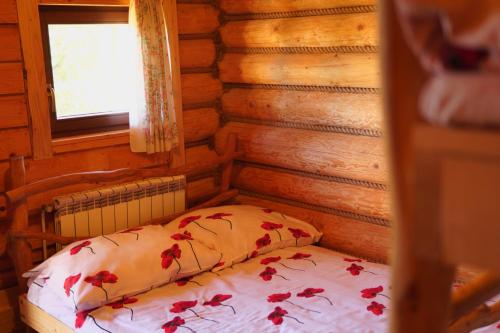 Postel nebo postele na pokoji v ubytování Dom Pachnacy Zywica