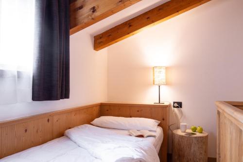 Una cama o camas en una habitación de Hotel Cirelle Suite & Spa