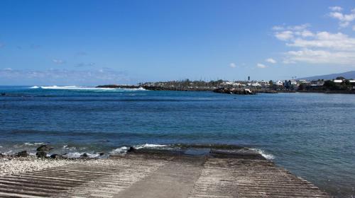 a dock in the water with a city in the background at T3 - 100m2 - Résidence Georgette in Terre Sainte