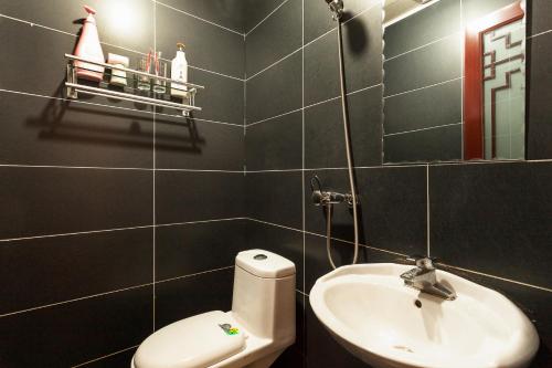 Koupelna v ubytování Pingyao Jiaxin Guesthouse