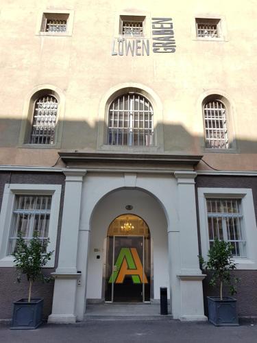 a building with a sign on the front of it at Barabas Luzern in Luzern