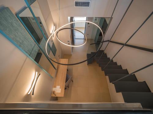 a spiral staircase in a building with a circle on it at Paradise Resort in Finikounta