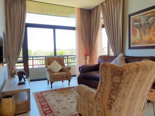 Zona de estar de Zimbali Suites 611