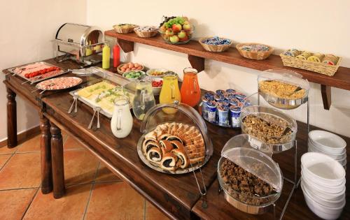 a table with many food items on it at Penzion Prelat in Český Krumlov