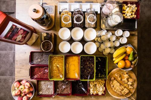 a table topped with different types of food and drinks at ibis Vilnius Centre in Vilnius