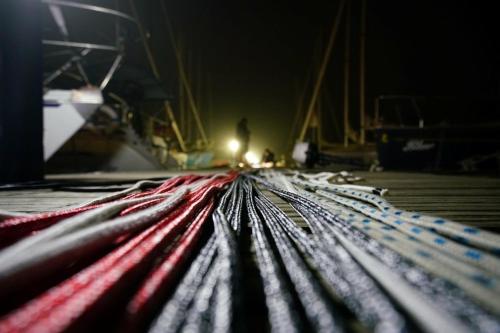 a group of red white and blue cords on a boat at LifeHarbour Limanu in Limanu