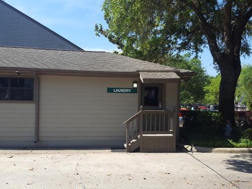 a garage with a sign that says university on it at Resort Attractions in Willis