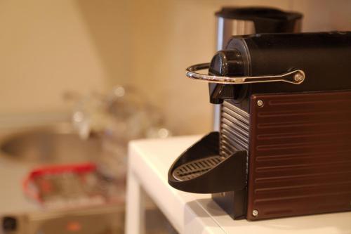 a telephone sitting on top of a counter at Hotel Junior in Kopaonik