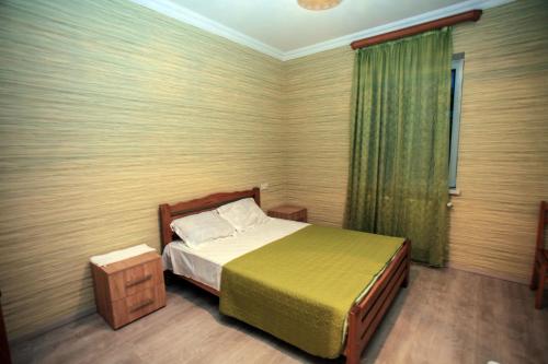 Postel nebo postele na pokoji v ubytování Guest House In Tbilisi