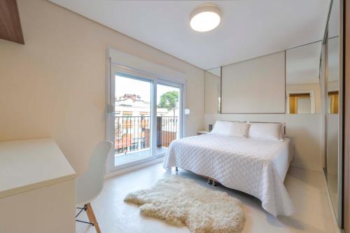Ένα ή περισσότερα κρεβάτια σε δωμάτιο στο Centro de Canela Apartamento Lindo