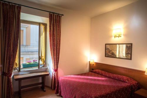Posteľ alebo postele v izbe v ubytovaní Domus Appia 154 B&B