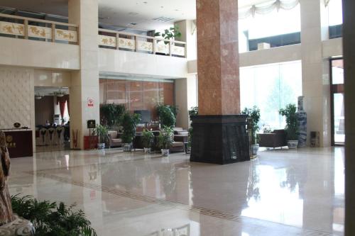 
The lobby or reception area at Golden Phoenix Hotel
