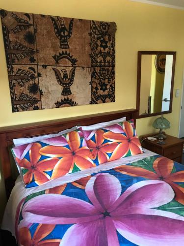 Кровать или кровати в номере Karikari Lodge