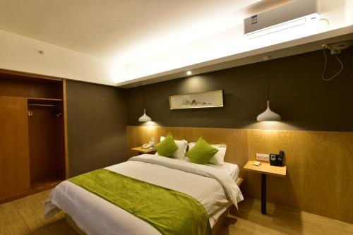 Postelja oz. postelje v sobi nastanitve Jihao Selected Hotel