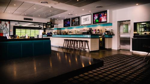 
a large kitchen with a lot of counter space at Coolangatta Sands Hotel in Gold Coast
