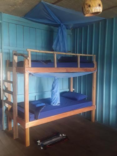 Palanda nebo palandy na pokoji v ubytování Firefly Guesthouse