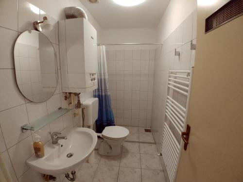 Kúpeľňa v ubytovaní Guesthouse Totićevi