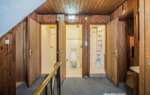 a bathroom with a toilet and a sink at Hocheckhuette On Top of the Kitzbuehel Hahnenkamm Mountain in Kitzbühel